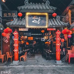 Tranh quán ăn treo lồng đèn đỏ trước quán cafe